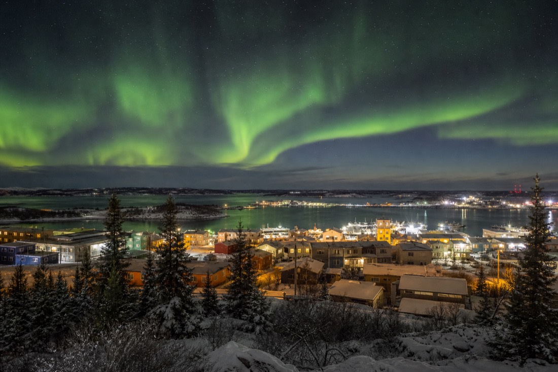 View from the Bush Pilots Monument over Old Town rooftops, floatplane docks and Yellowknife Bay