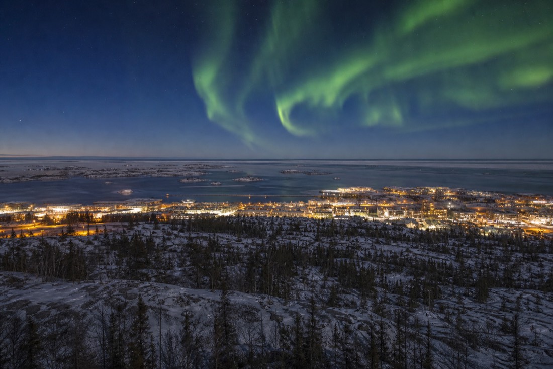 Aerial view of Yellowknife on the rocky north shore of Great Slave Lake stretching to the horizon